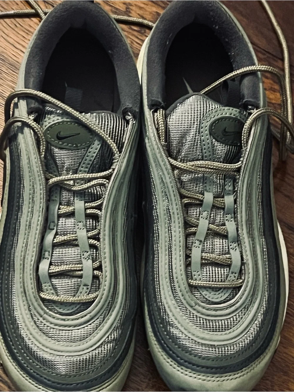 Nike women’s Air Max 97 in Olive Green . Size 8.5. Gently used.